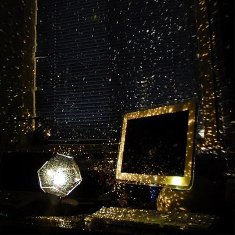 LED starry sky projector night light showing constellation projection on a bedroom ceiling