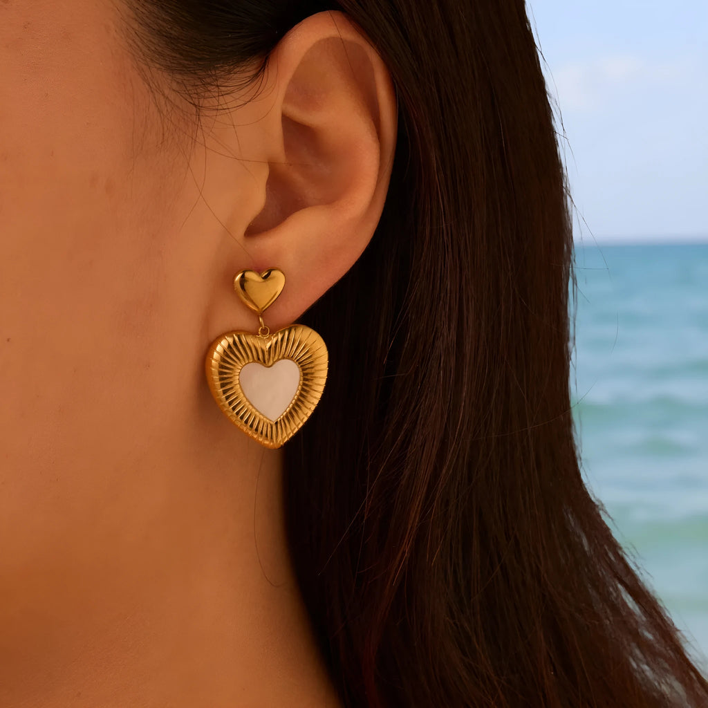 Gold electroplated heart-shaped stainless steel earrings for women with love-themed design