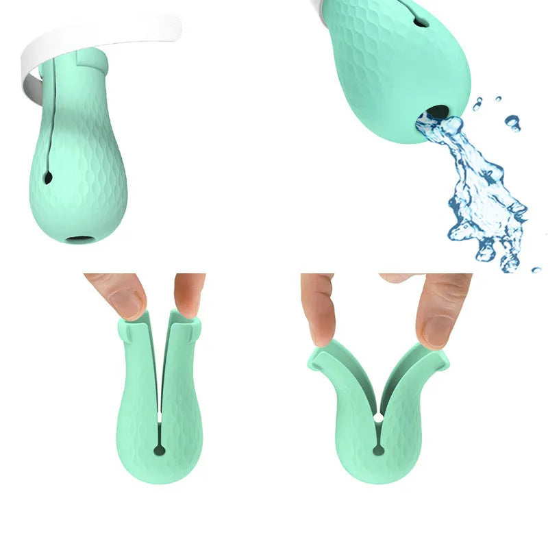 Four green silicone foot covers for protecting hands from cat scratches during pet care.