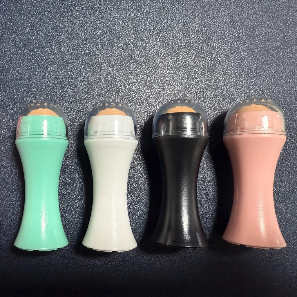 Volcanic stone facial roller for oily skin control in black, green, pink, or white colours