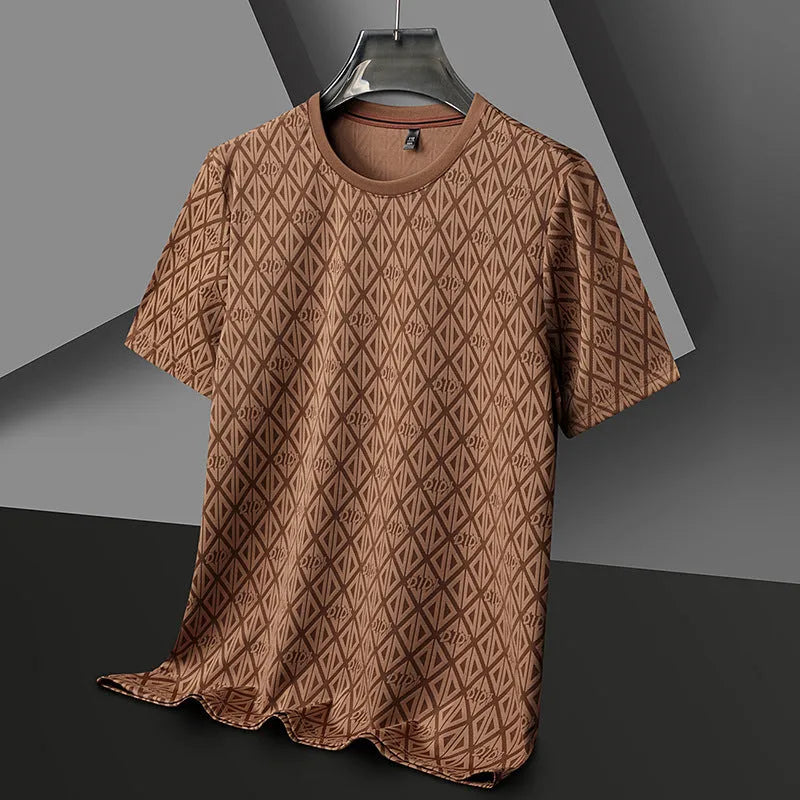 Man wearing a loose fit black Jacquard short sleeve T-shirt with a round neckline.