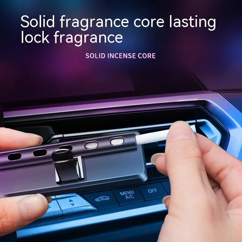 Black car air outlet perfume deodorant with LED lighting mounted in vehicle vent