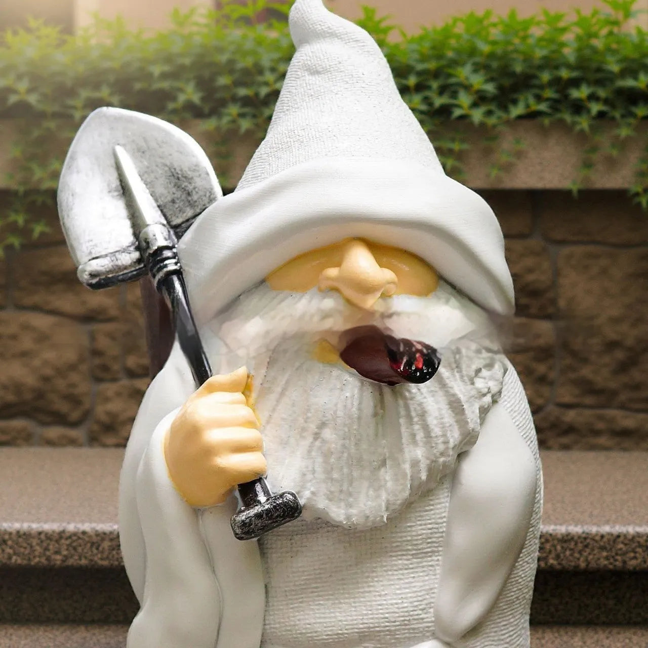 Smoking shovel dwarf Christmas garden ornament made from resin and plastic materials