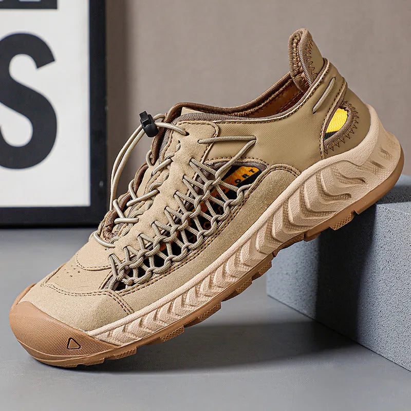 Men's hand-woven sandals in light gray with closed toe, elastic band, and rubber sole.