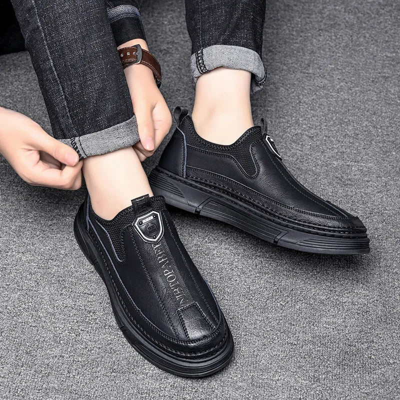 Men's solid black leather casual lace-up shoes with round toe on a white background.