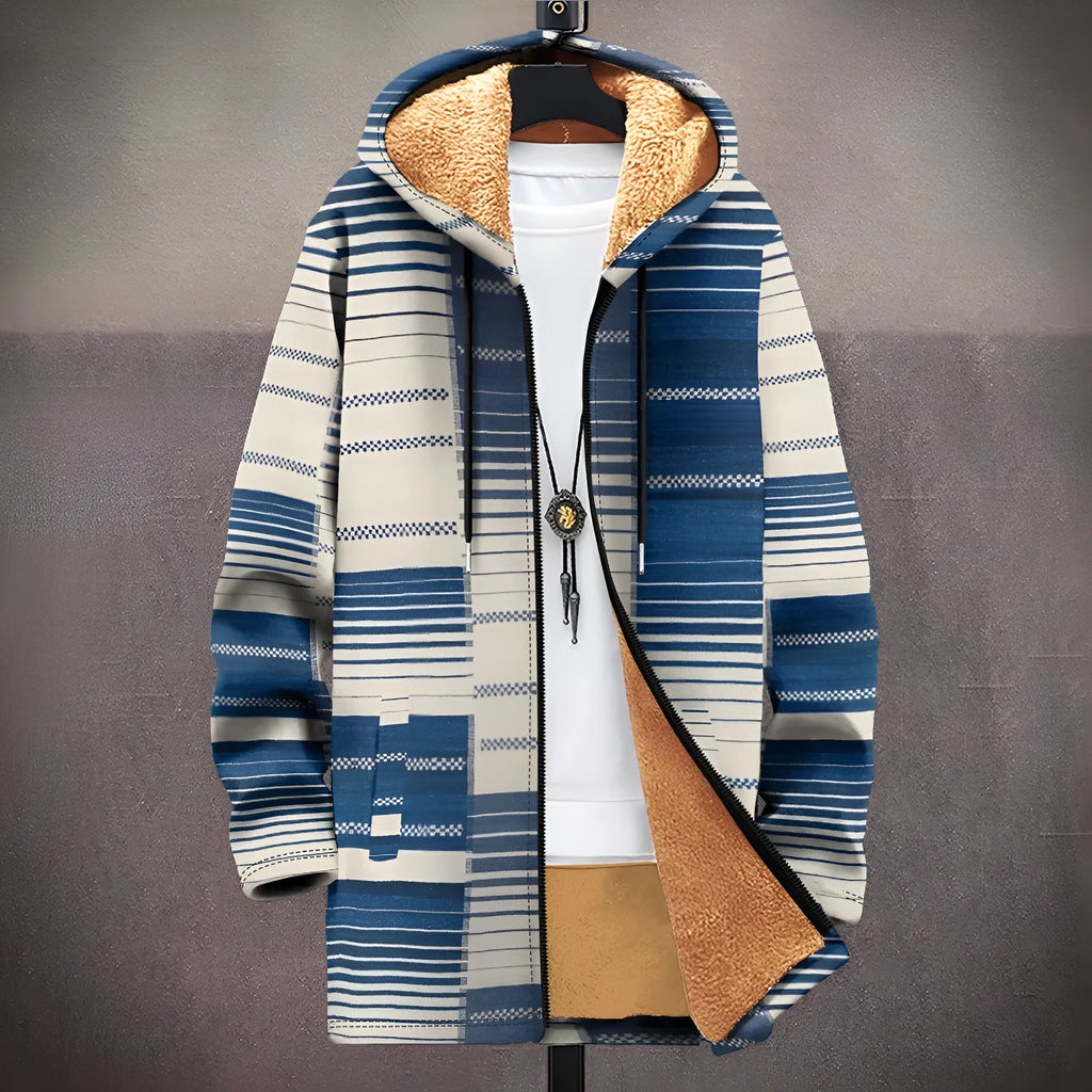 Man wearing a loose fit hooded cardigan with a front zipper and digital multicolour print pattern.
