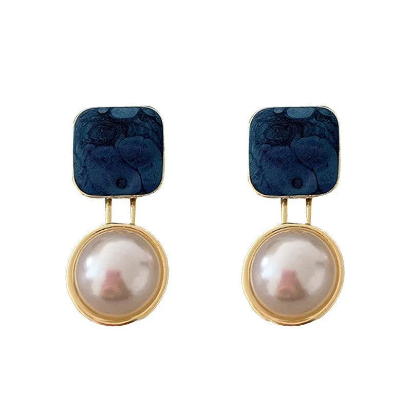 Red and blue geometric alloy stud earrings with pearl detail and quadrilateral shape, one pair