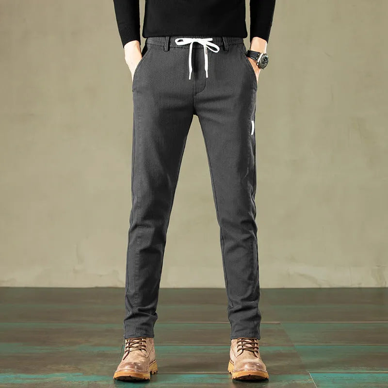 Loose straight cotton casual pants in solid colour with mid waist drawstring, sizes 28-38