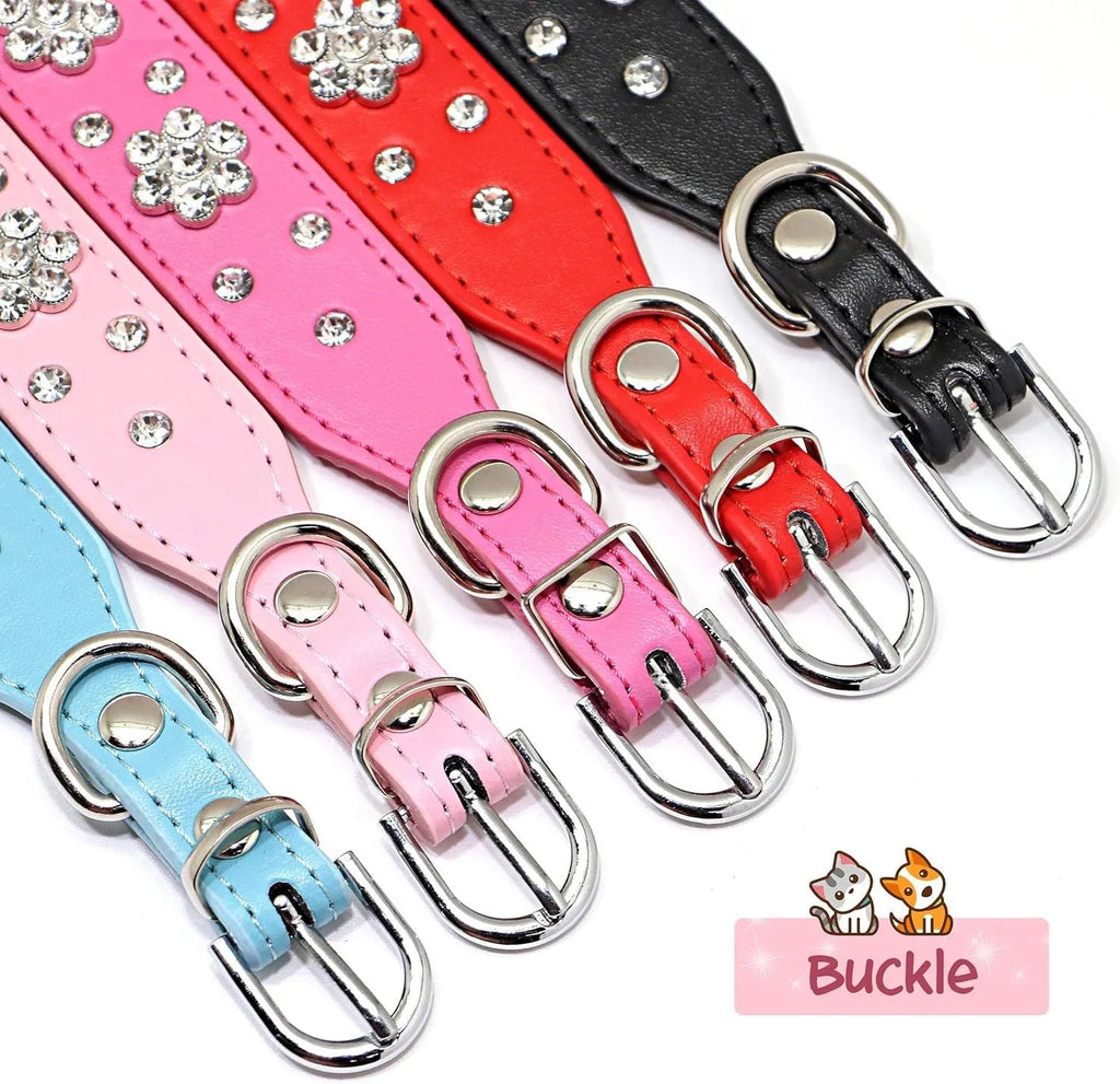 Soft black PU leather dog collar with a sparkling rhinestone flower pattern and silver metal studs, showing the adjustable eyelets and D-ring.