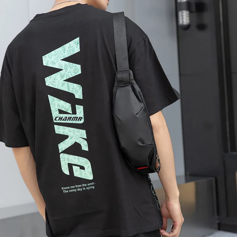 Black Oxford cloth men's single shoulder crossbody bag showing phone pocket and zipper compartments