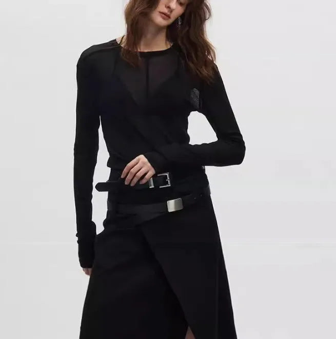 Women's black slim-fit mesh see-through long sleeve PU pullover on a hanger.