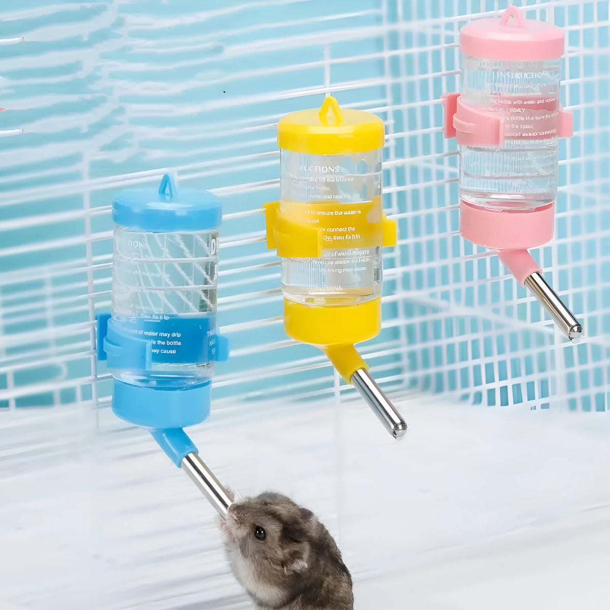 Green plastic ball kettle pet water feeder with leak-proof design for small animal cages.