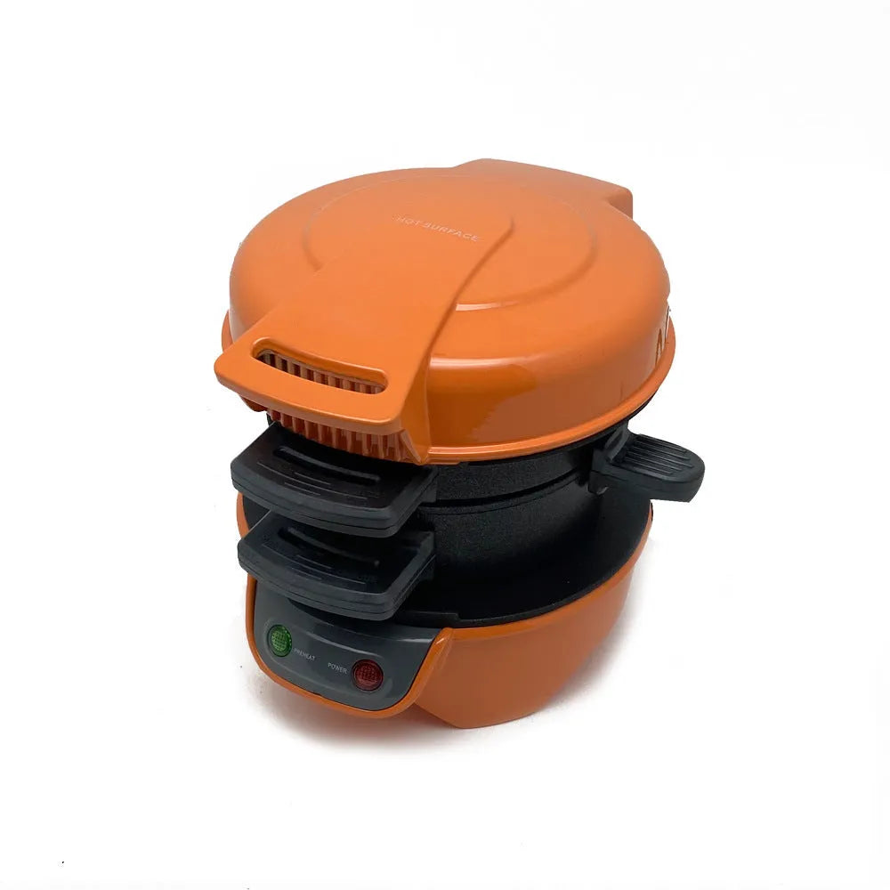 Bright red multifunction breakfast sandwich maker with egg cooker ring and two baking trays