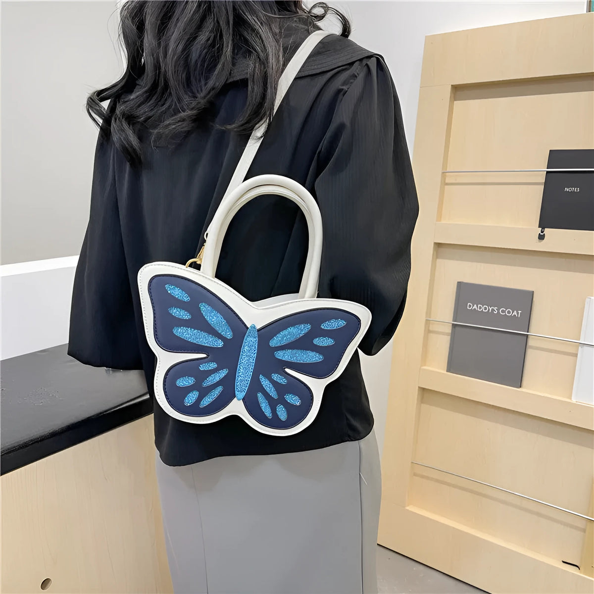 Women's small square crossbody shoulder bag in PU material measuring 27cm by 8cm by 14cm