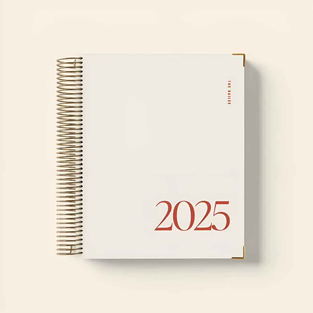 Cherry red daily schedule spiral notebook with coil binding and dated sections