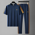 Men's blue ice silk style suit set with short sleeves, showing top and pants.