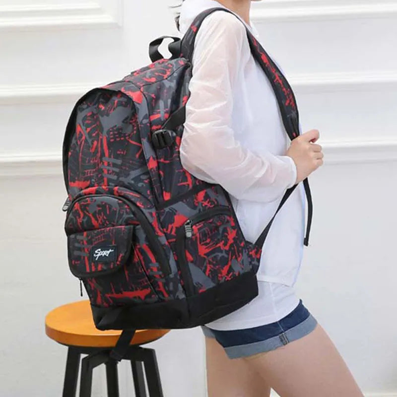 Blue and red versions of a classic nylon backpack with large main compartment and organisational pockets.