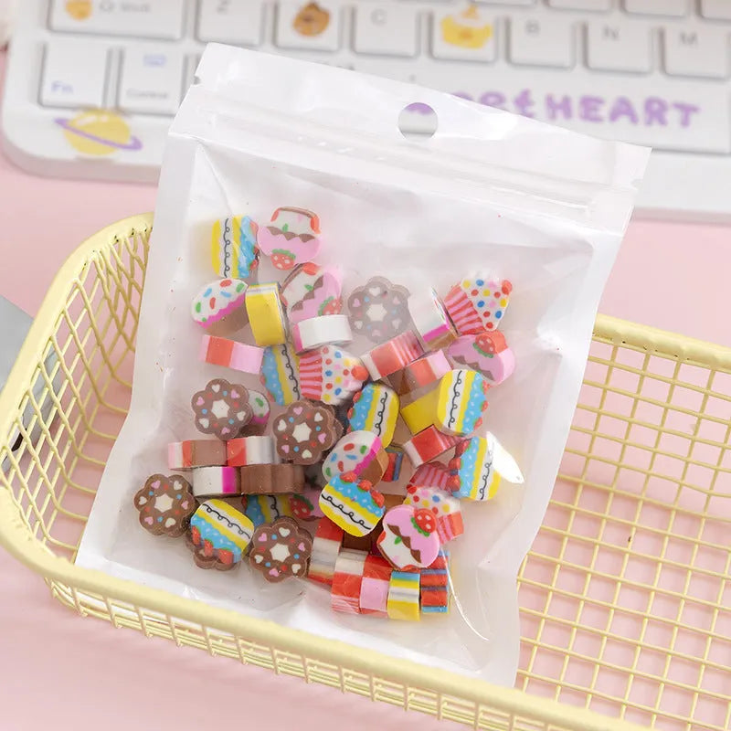 50 colourful cartoon mini erasers in fruit animal cake and seasonal designs measuring 1-1.5cm