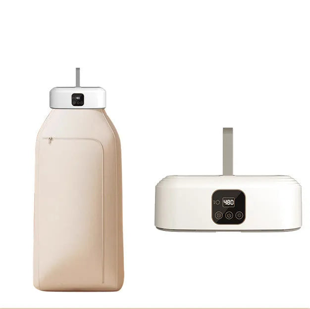 White cylindrical foldable clothes dryer with remote control on flat surface showing compact dimensions