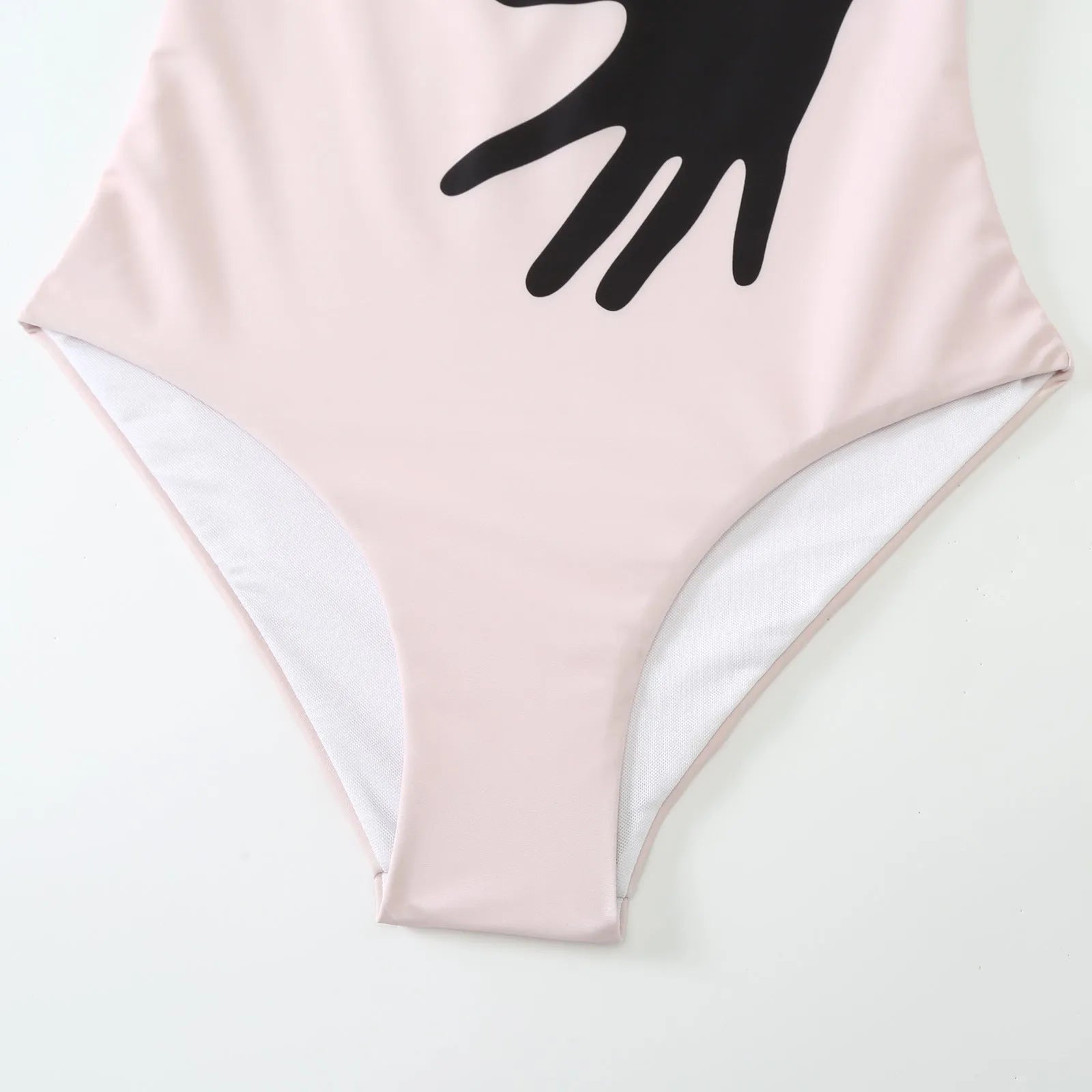 Women's patterned one-piece bikini two-piece set with a light grey tulle skirt attached.