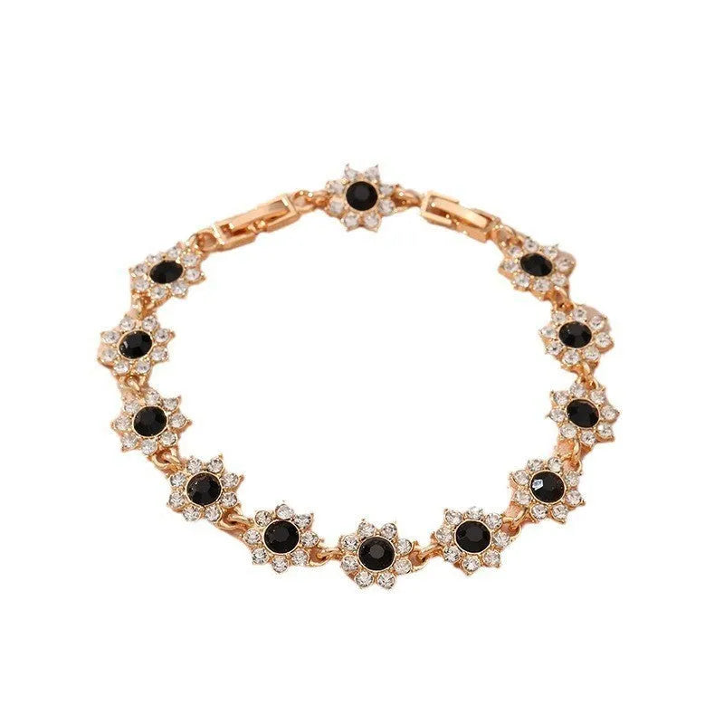Flower-shaped zinc alloy bracelet with electroplated finish and coloured gem accents