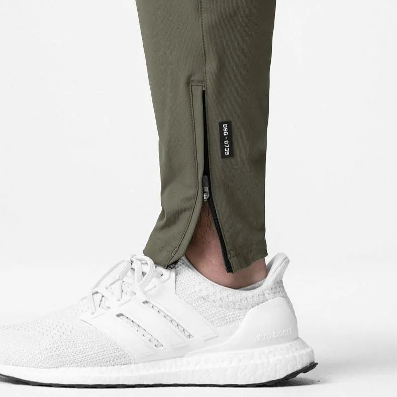 Men's grey quick-dry running pants with ankle-tied cuffs for fitness workouts