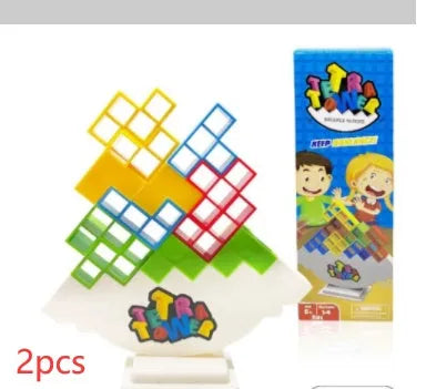Plastic balance stacking board game with colourful blocks, chassis, and base on table
