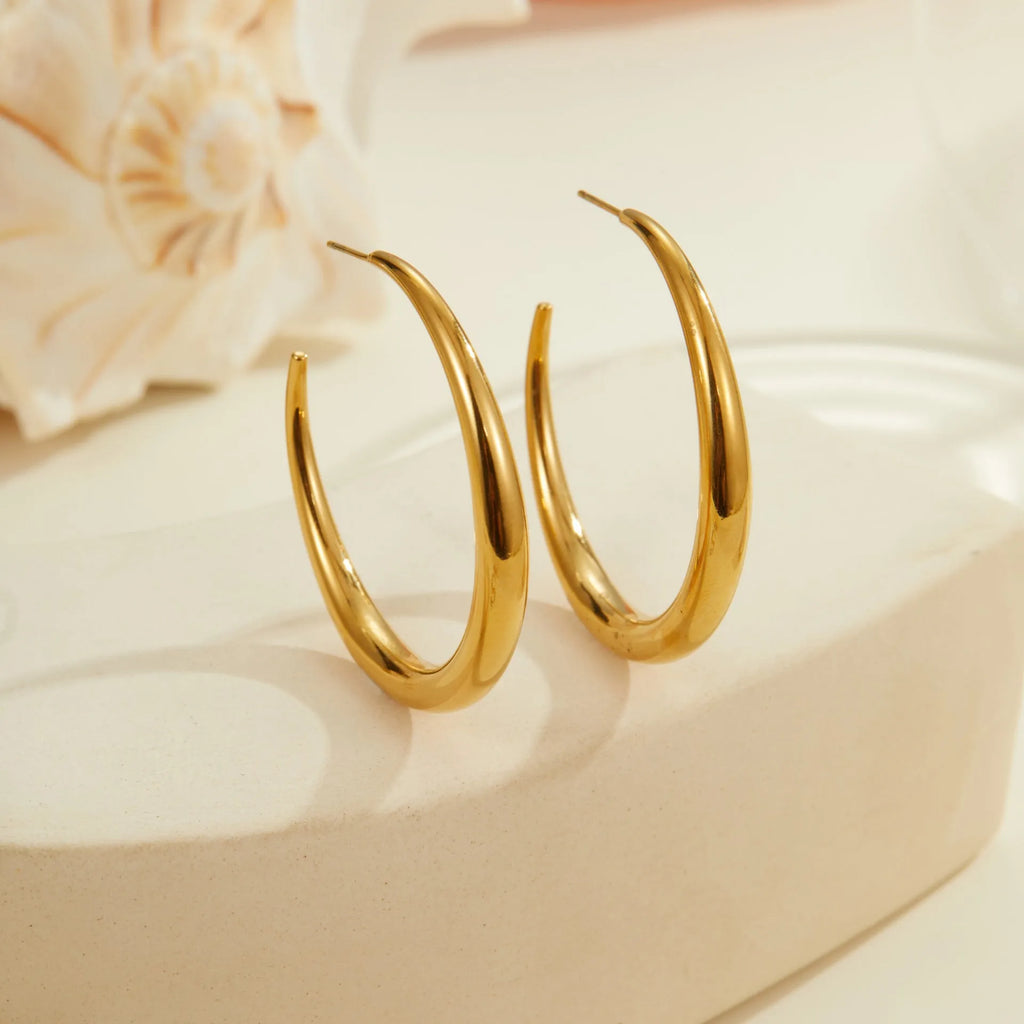 Titanium steel geometric circular hoop earrings with 18K gold plating in large or small sizes