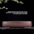 Handmade antique rectangular purple clay flower pot showing traditional finish