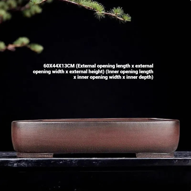 Handmade antique rectangular purple clay flower pot showing traditional finish