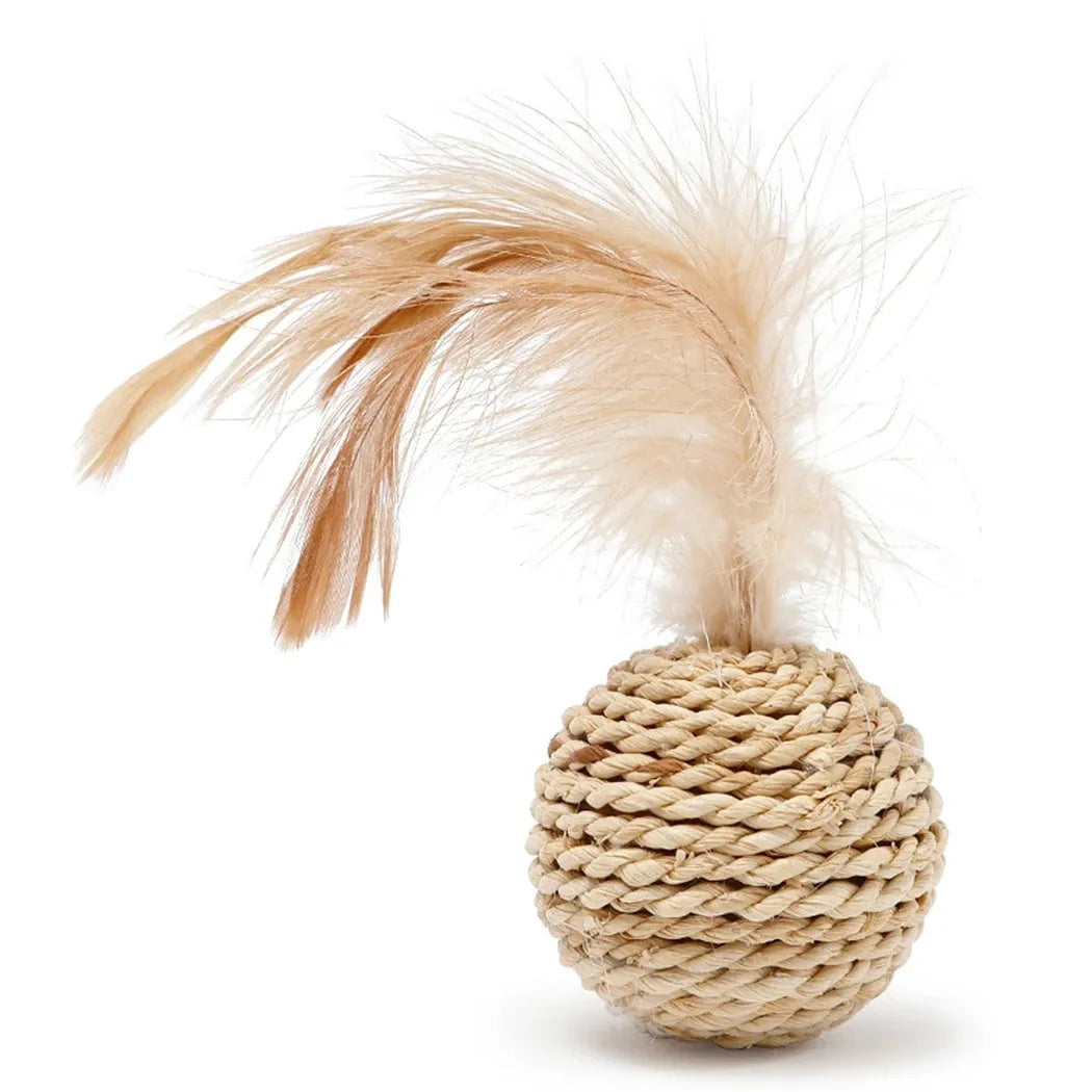 Two cat toys: a rattan ball with a bell and a faux feather ball on a plain background.