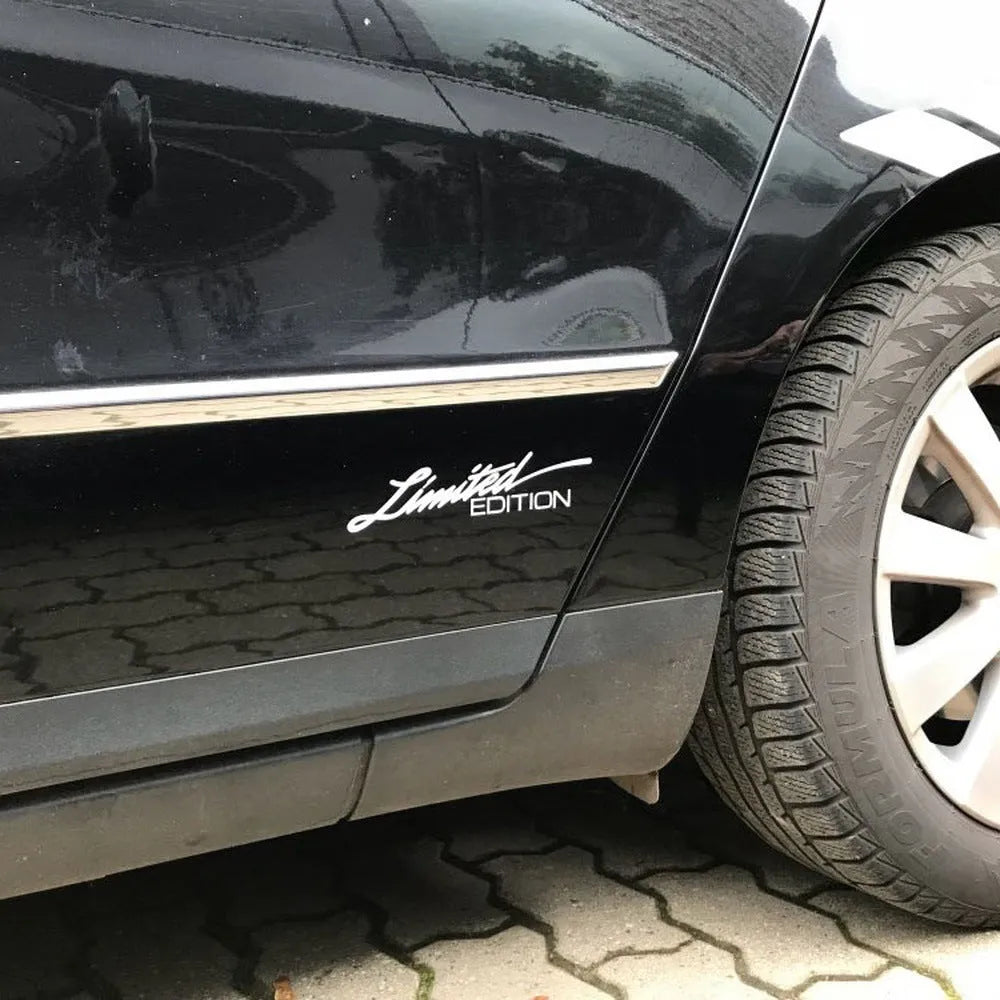 Reflective rectangular bumper sticker measuring 16cm by 3.8cm in black, white, and multi-colour options.