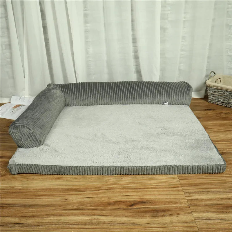 Corduroy pet sofa dog bed with bolster in grey colour, showing non-slip base and high-density sponge padding