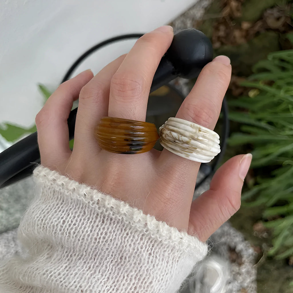 Geometric resin wide ring with irregular shape in retro Chinese style showing earthy colour options