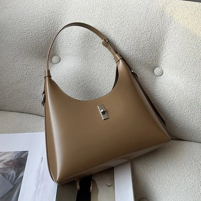 Genuine leather crossbody shoulder bag in dumpling shape with organised compartments