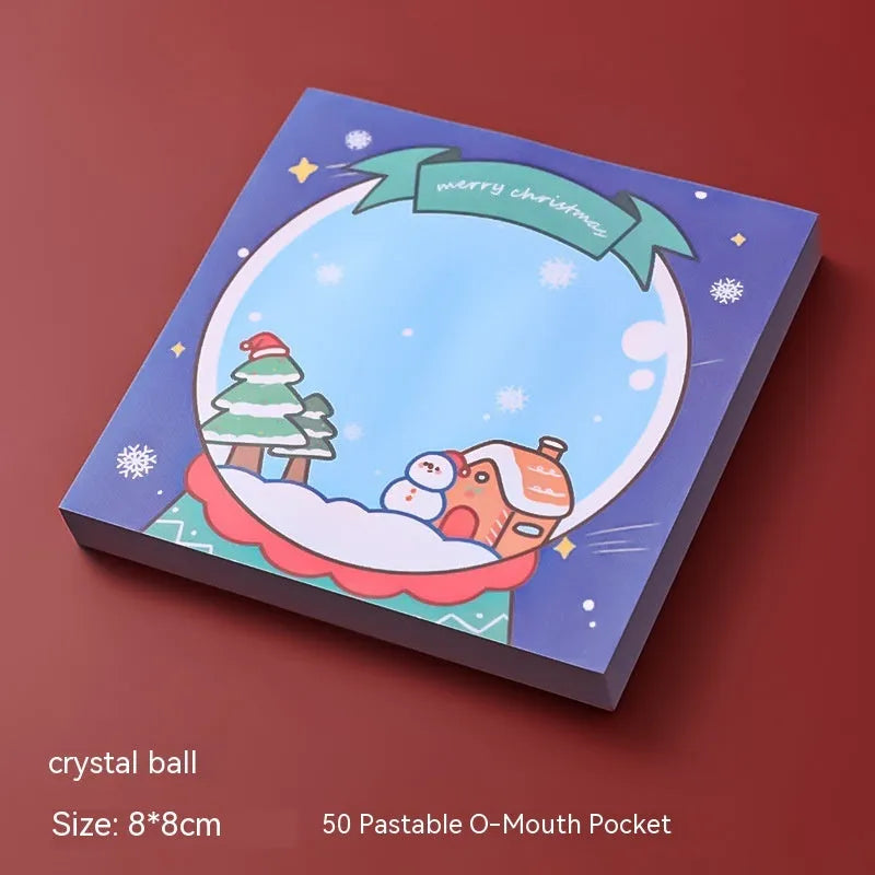 Christmas sticky notes book with cartoon designs of Santa, snowman, elf, gift, house, sled, crystal ball, and bear