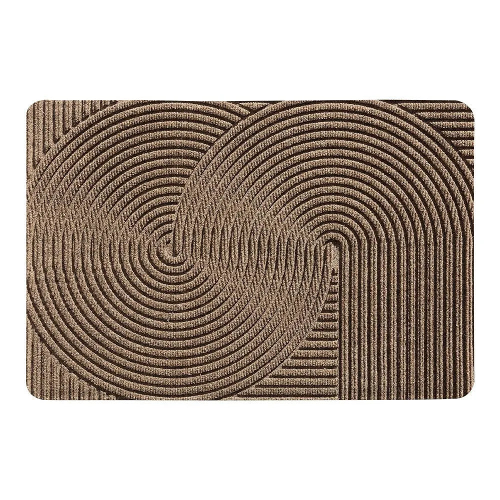 Green alien-shaped floor mat with cartoon pattern, measuring 60 by 90 cm with a wire ring border.
