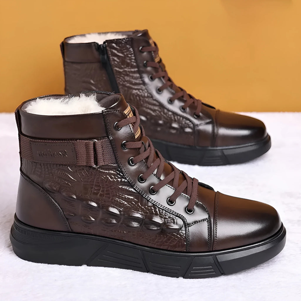 Men's black genuine leather snow boots with integrated fur trim and lace-up front.