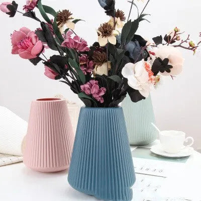 Colourful melamine plastic decorative vase measuring 16cm by 20cm in white, pink, green, or blue
