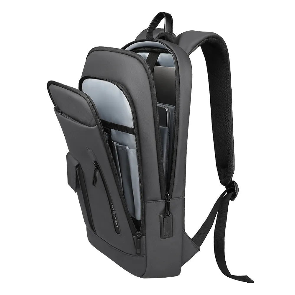Men's lightweight Oxford cloth backpack in dark grey, shown from the side with visible sewing line details.