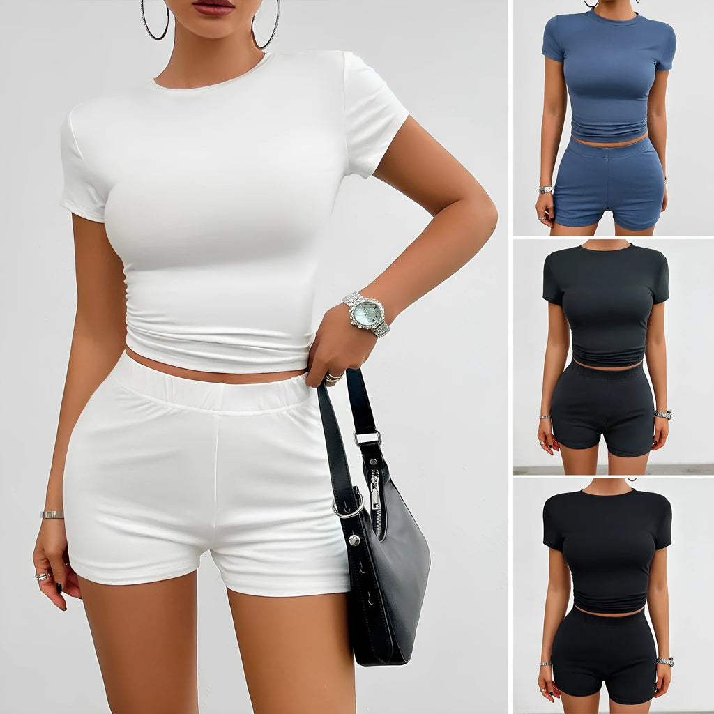 Women's solid colour viscose sports set with short sleeve t-shirt and elastic waist shorts.