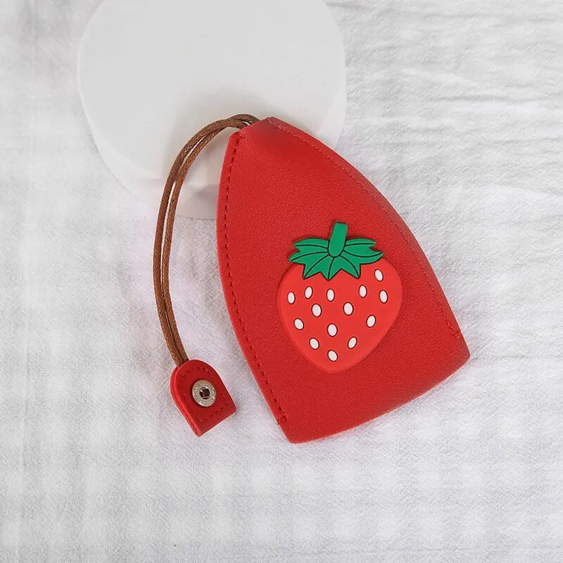 Cartoon PU leather pull-out car key case measuring 14 x 7.5cm with colourful designs