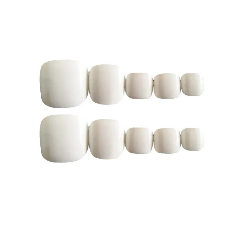 White false toe nails with starry sky pattern, a glue-on artificial nail set for ladies.