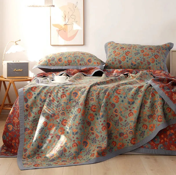 Cotton gauze bed blanket three-piece set with plants and flowers pattern showing blanket and matching pillowcases