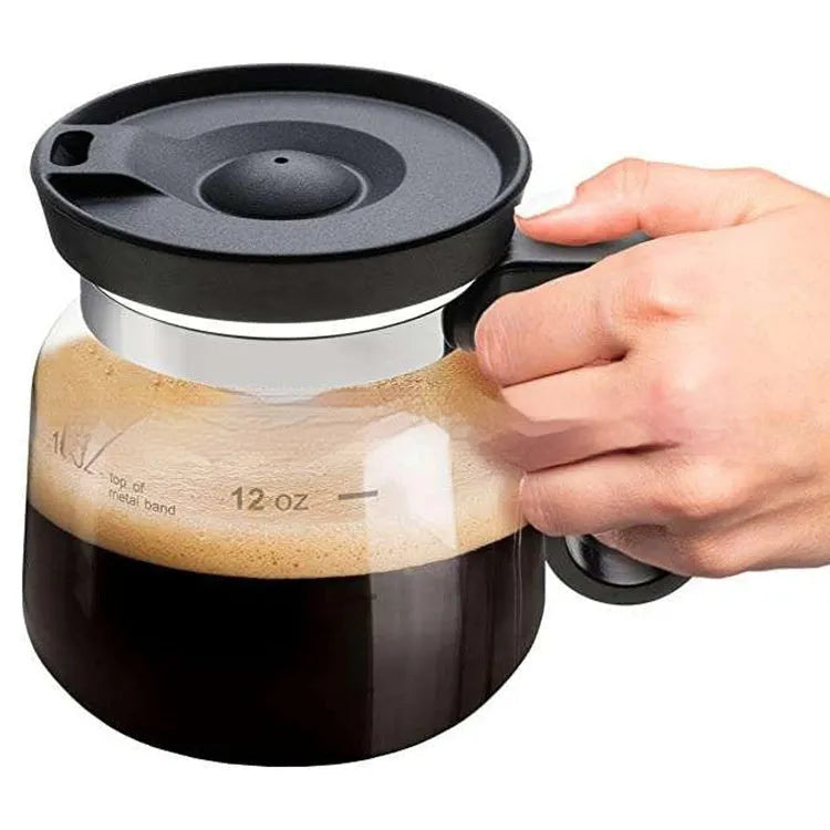 Transparent borosilicate glass coffee maker with silicone cover showing modern simple style