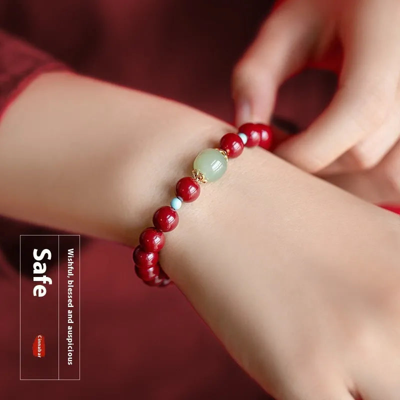 Purple gold sand cinnabar and coated metal bracelet with geometric ellipse beads.