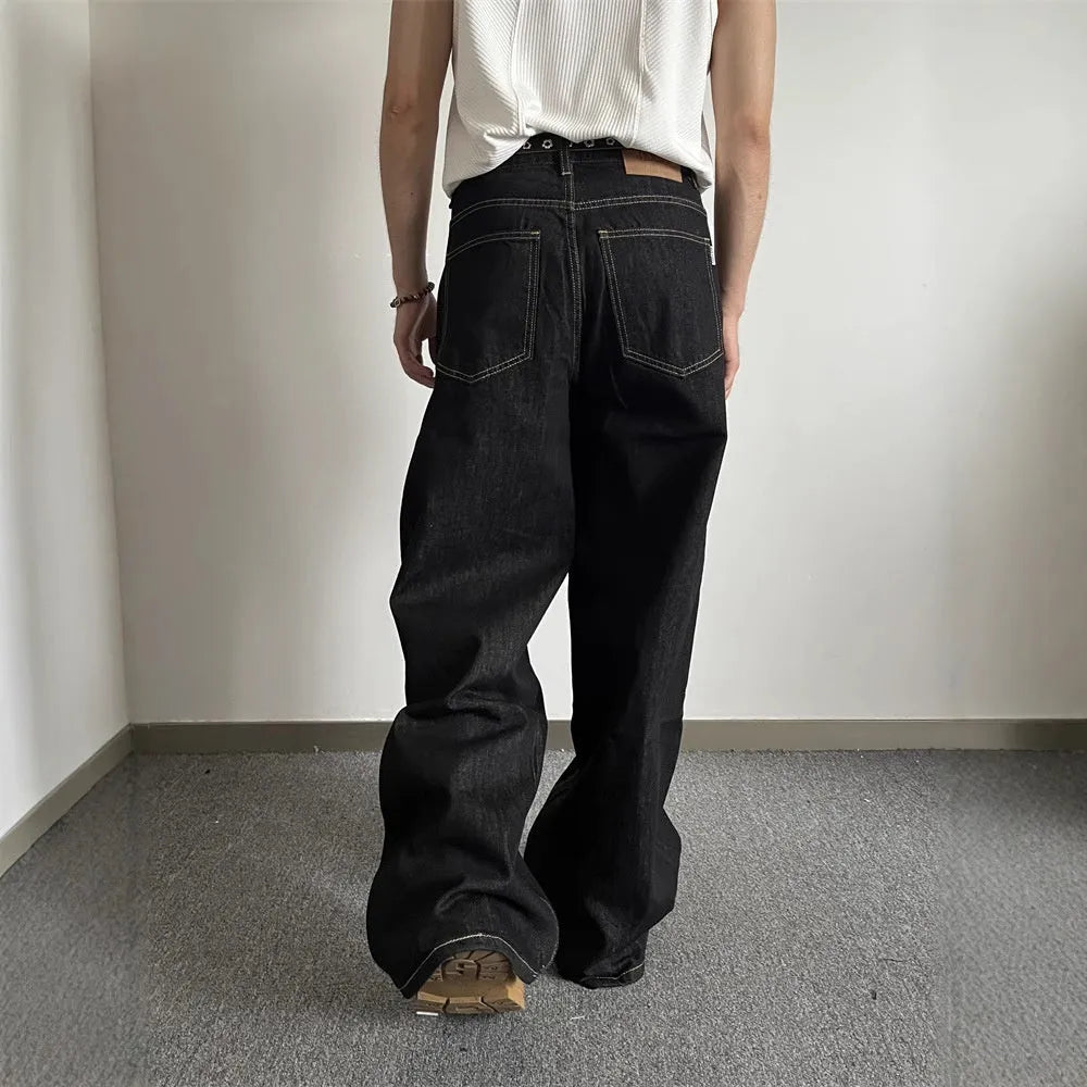 Black loose wide-leg retro jeans with a straight-leg cut and mid waist on a mannequin.