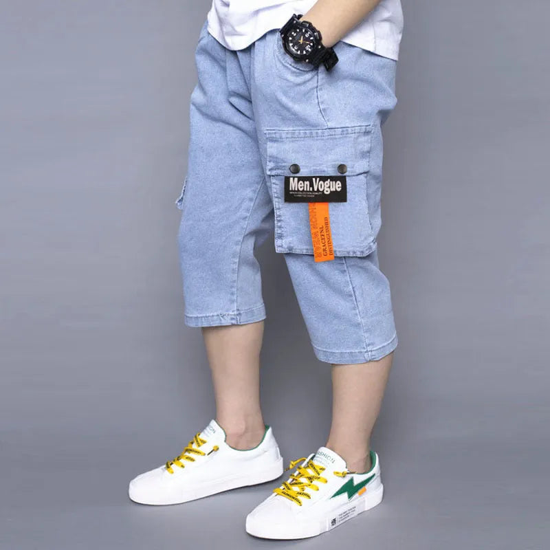 Boys loose stretch cropped jeans in blue cotton with high waist, sizes 105cm to 170cm