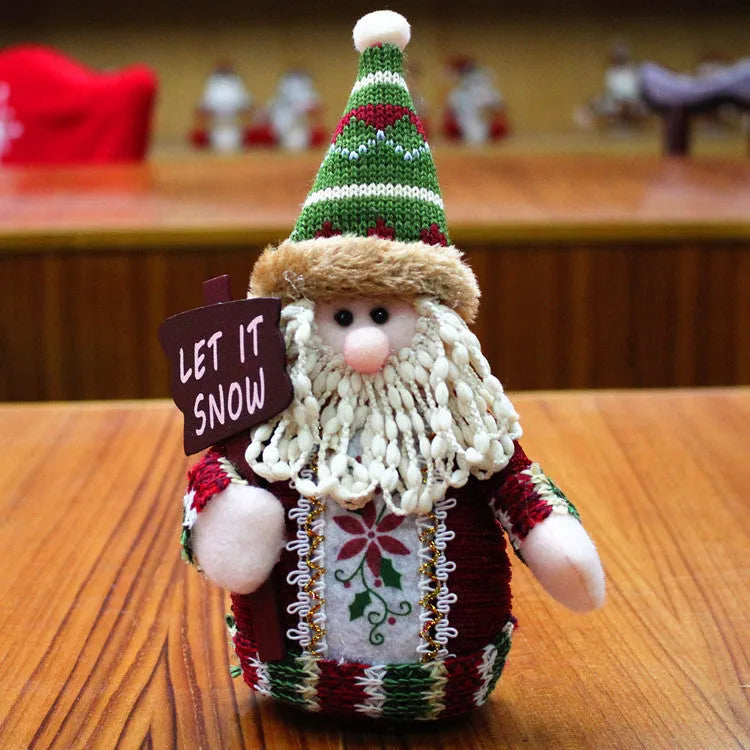 Red, green, and white flannel snowman Christmas decoration measuring 18cm by 13cm