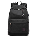 Canvas backpack in grey colour showing USB charging port, front zipper pocket, and adjustable shoulder straps